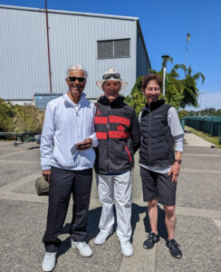 2nd place: (L to R) Gopal Gowda(Lead), presenter .... Donna Blackstock (Skip) 